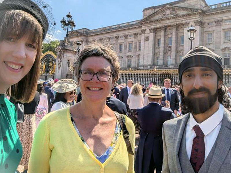 Caitriona Woolhouse, Dr Jo Begbie and former Astrophoria Foundation Year student, Bassam, outside Buckingham Palace