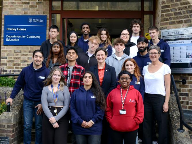 The 2023 Astrophoria Foundation Year cohort, Professor Irene Tracey and Dr Jo Begbie standing outside the Oxford University Department of Continuing Education building