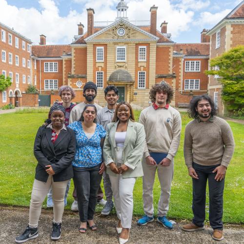 Vee Kativhu and Astrophoria Foundation Year Students standing in the main quad at Lady Margaret Hall College