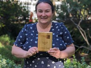 Astrophoria Foundation Year Welfare Lead Cat holding OLLIE award